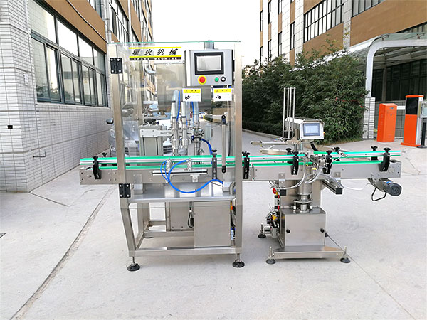 星火全自動(dòng)辣椒醬灌裝機(jī)廠房設(shè)備實(shí)拍圖